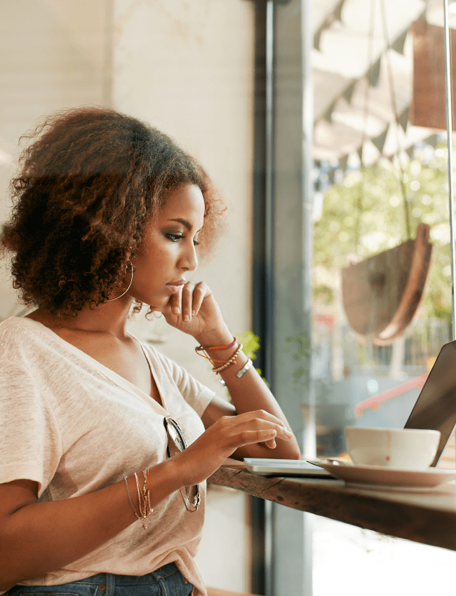 Person working through thought patterns during an online CBT session