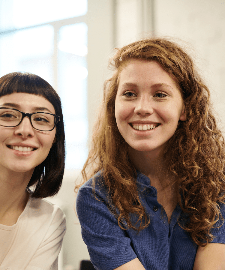 women smiling Trauma Therapy